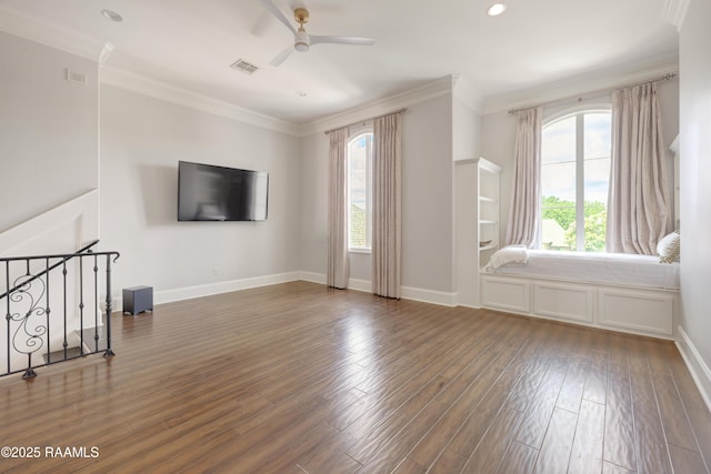 506 Terrell Ct, New Iberia, LA 70563 - unfurnished living room with plenty of natural light, ceiling fan, crown molding, wood finished floors, and recessed lighting
