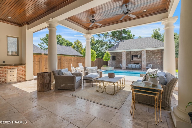 506 Terrell Ct, New Iberia, LA 70563 - view of patio / terrace with an outdoor hangout area, ceiling fan, an outbuilding, and a storage structure