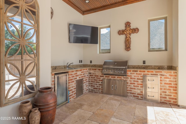 506 Terrell Ct, New Iberia, LA 70563 - view of patio featuring exterior kitchen and a sink