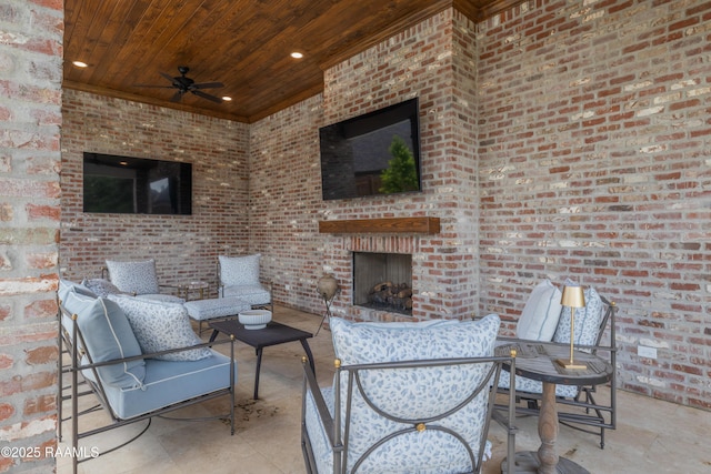 506 Terrell Ct, New Iberia, LA 70563 - view of patio / terrace featuring a ceiling fan and an outdoor living space with a fireplace