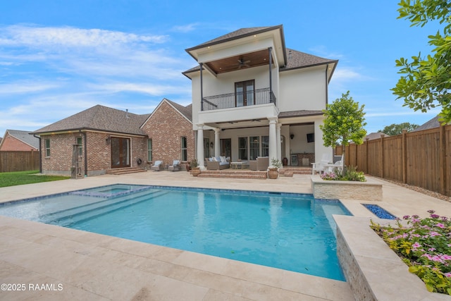 506 Terrell Ct, New Iberia, LA 70563 - view of swimming pool with a ceiling fan, an outdoor hangout area, a fenced backyard, and a patio