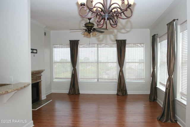 201 Settlers Trace Blvd Unit 2410, Lafayette, LA 70508 - unfurnished living room featuring wood finished floors, ornamental molding, a ceiling fan, and plenty of natural light