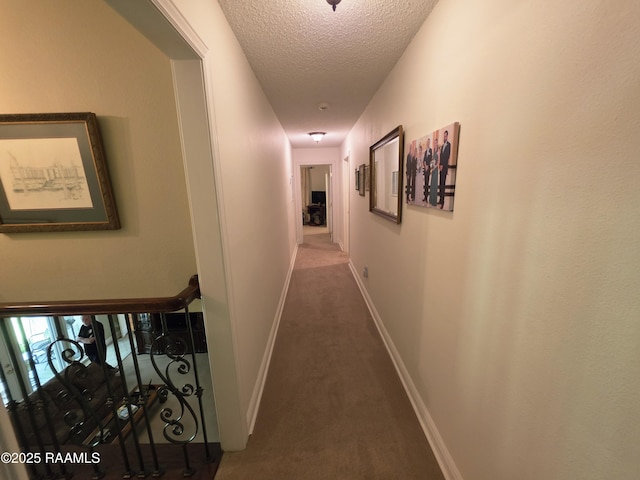 104 Running Deer Dr, Lafayette, LA 70503 - hallway featuring carpet and a textured ceiling