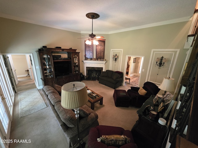 104 Running Deer Dr, Lafayette, LA 70503 - carpeted living area with ornamental molding, a ceiling fan, and a fireplace