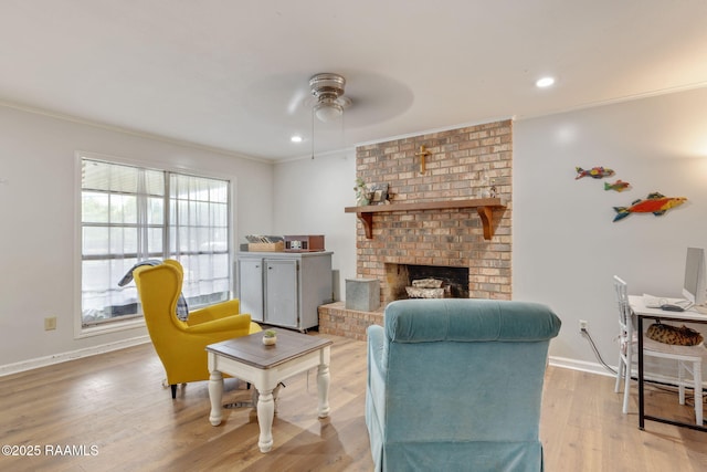 40 Hidden Hills Rd, Arnaudville, LA 70512 - living room with a ceiling fan, crown molding, wood finished floors, a fireplace, and recessed lighting