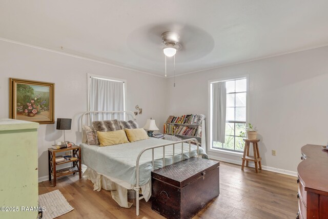 40 Hidden Hills Rd, Arnaudville, LA 70512 - bedroom with wood finished floors and a ceiling fan