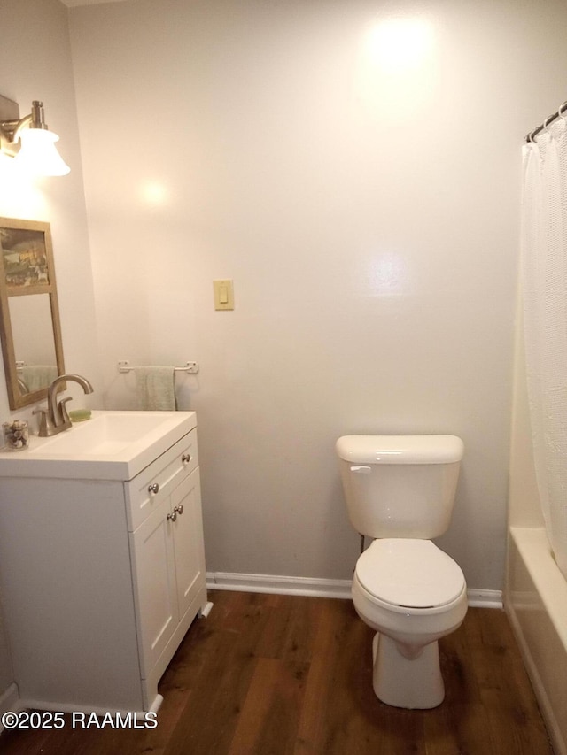 40 Hidden Hills Rd, Arnaudville, LA 70512 - full bath featuring vanity, wood finished floors, and shower / bathtub combination with curtain