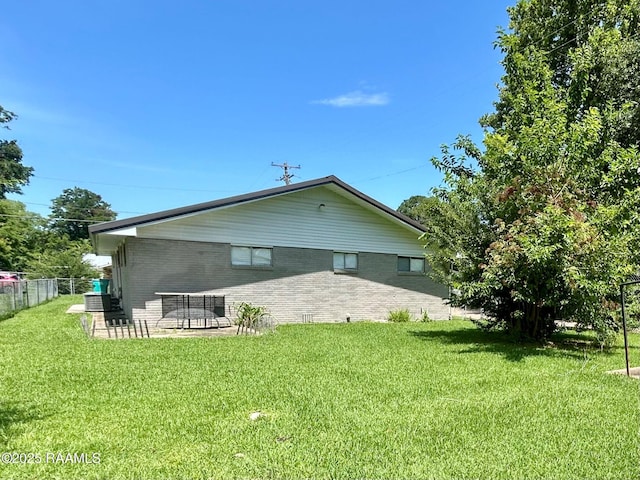 104 E Coleman St, Opelousas, LA 70570 - rear view of property with brick siding