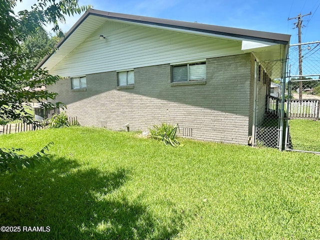 104 E Coleman St, Opelousas, LA 70570 - view of side of property featuring brick siding