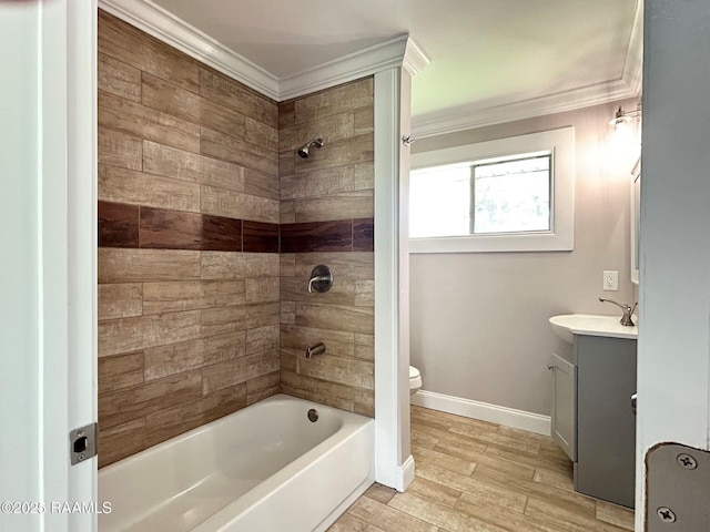 104 E Coleman St, Opelousas, LA 70570 - full bath featuring vanity, crown molding, tub / shower combination, and wood finished floors