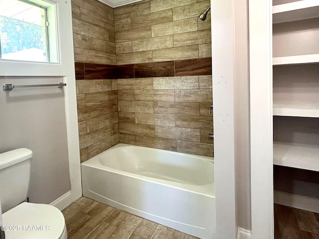 104 E Coleman St, Opelousas, LA 70570 - bathroom featuring wood finished floors and bathtub / shower combination