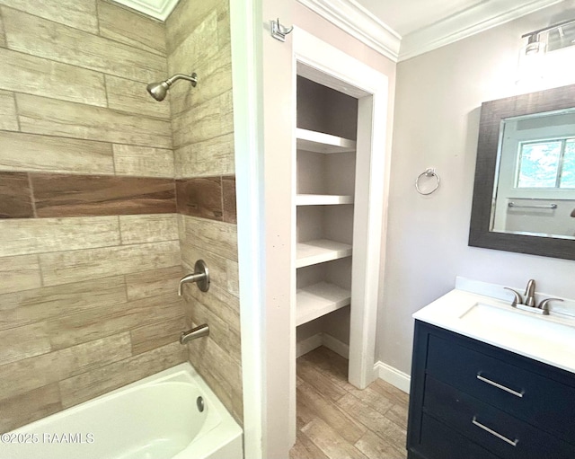 104 E Coleman St, Opelousas, LA 70570 - bathroom featuring shower / tub combination, crown molding, vanity, and wood finished floors