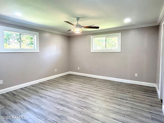 104 E Coleman St, Opelousas, LA 70570 - spare room with ornamental molding, ceiling fan, plenty of natural light, wood finished floors, and recessed lighting