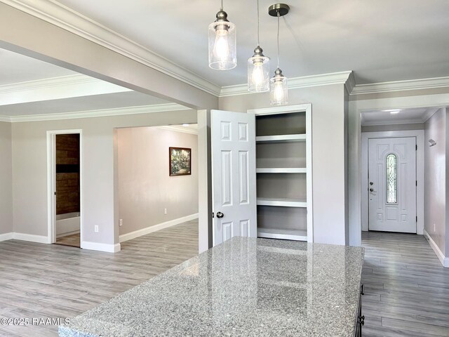 104 E Coleman St, Opelousas, LA 70570 - foyer featuring wood finished floors and ornamental molding