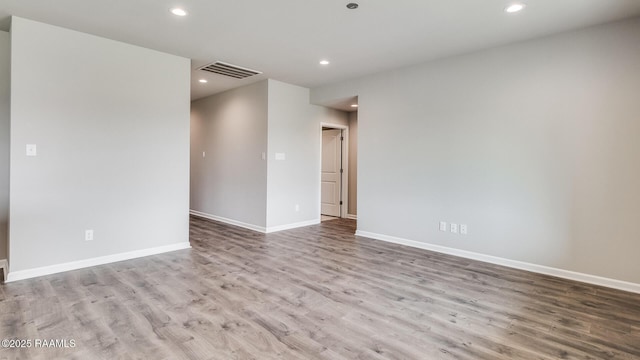 322 White Pine Dr, Lafayette, LA 70501 - empty room featuring recessed lighting and wood finished floors