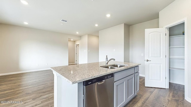 322 White Pine Dr, Lafayette, LA 70501 - kitchen featuring dishwasher, dark wood-style flooring, light stone counters, recessed lighting, and a center island with sink