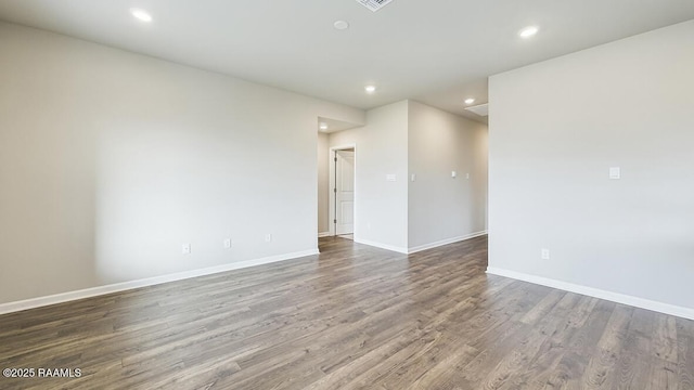 322 White Pine Dr, Lafayette, LA 70501 - spare room with wood finished floors and recessed lighting