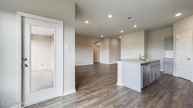 322 White Pine Dr, Lafayette, LA 70501 - kitchen featuring dishwasher, dark wood-type flooring, light countertops, gray cabinets, and recessed lighting