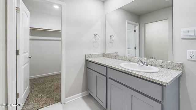 322 White Pine Dr, Lafayette, LA 70501 - bathroom with vanity and a walk in closet