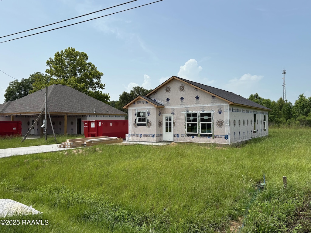 1750 Hazel St, Eunice, LA 70535 - rear view of property featuring stucco siding