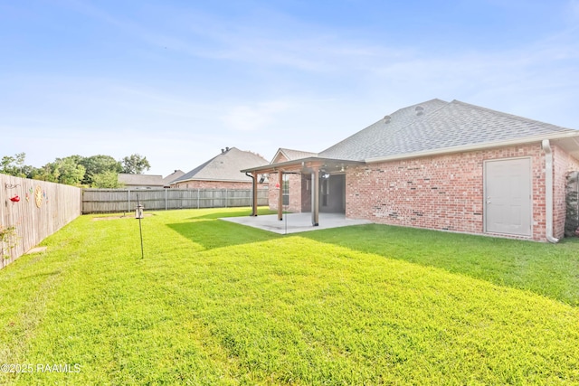 105 Clear Lake Dr, Lafayette, LA 70506 - fenced backyard with a patio area