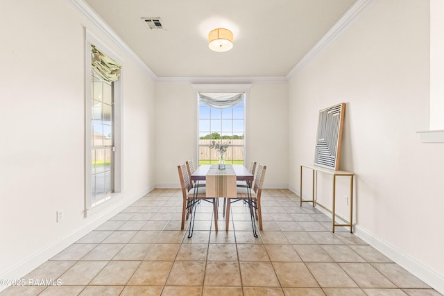 105 Clear Lake Dr, Lafayette, LA 70506 - dining space featuring ornamental molding and light tile patterned floors