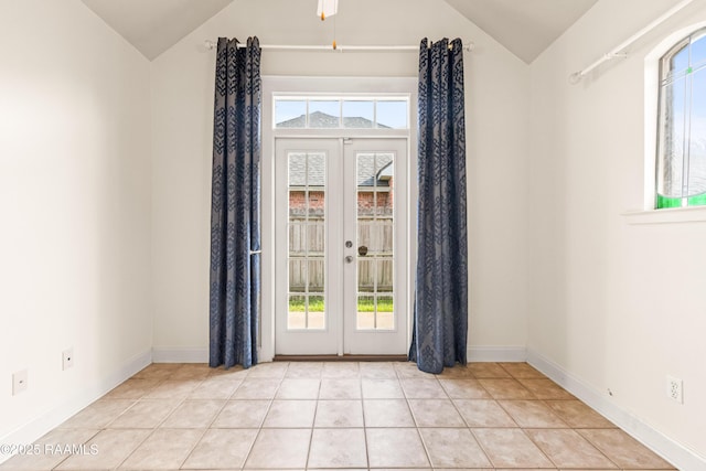 105 Clear Lake Dr, Lafayette, LA 70506 - unfurnished room featuring lofted ceiling, french doors, and light tile patterned floors
