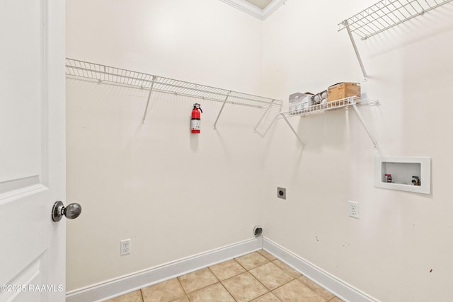 105 Clear Lake Dr, Lafayette, LA 70506 - washroom featuring electric dryer hookup, washer hookup, light tile patterned flooring, and ornamental molding