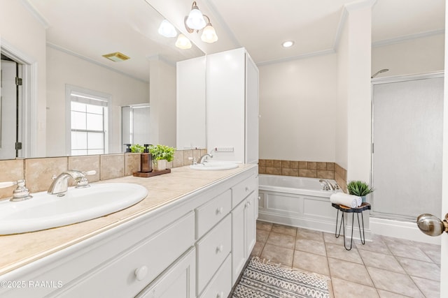 105 Clear Lake Dr, Lafayette, LA 70506 - full bathroom featuring a shower stall, double vanity, a garden tub, tile patterned floors, and ornamental molding