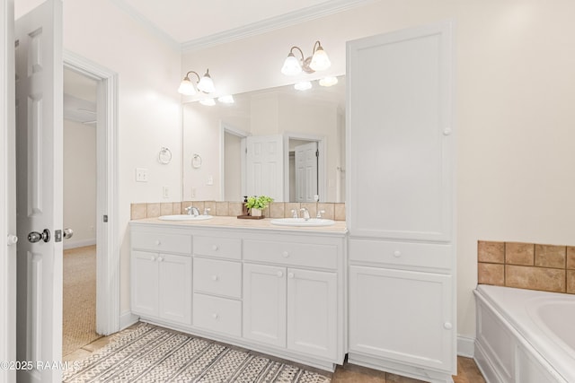 105 Clear Lake Dr, Lafayette, LA 70506 - bathroom featuring double vanity, ornamental molding, a garden tub, and tile patterned floors