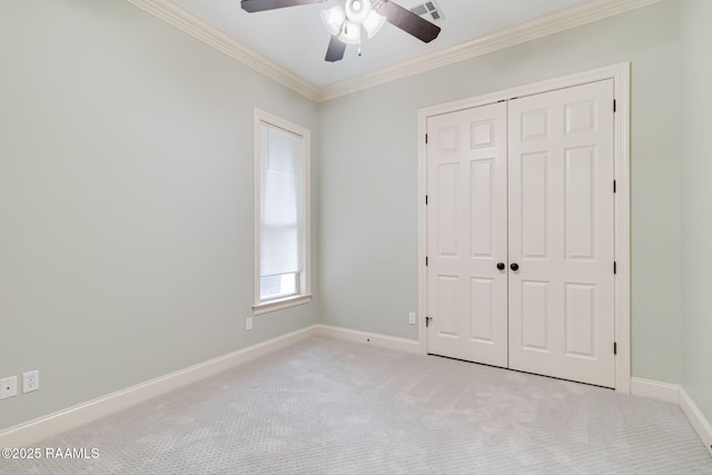 100 Serenity Sound Dr, Lafayette, LA 70506 - unfurnished bedroom with ornamental molding, light carpet, a closet, and a ceiling fan
