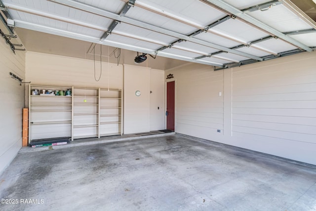 100 Serenity Sound Dr, Lafayette, LA 70506 - garage featuring a garage door opener