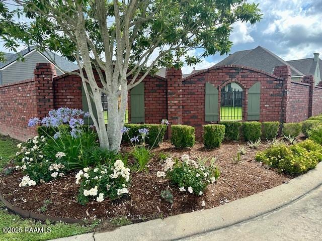 100 Serenity Sound Dr, Lafayette, LA 70506 - view of front facade featuring brick siding