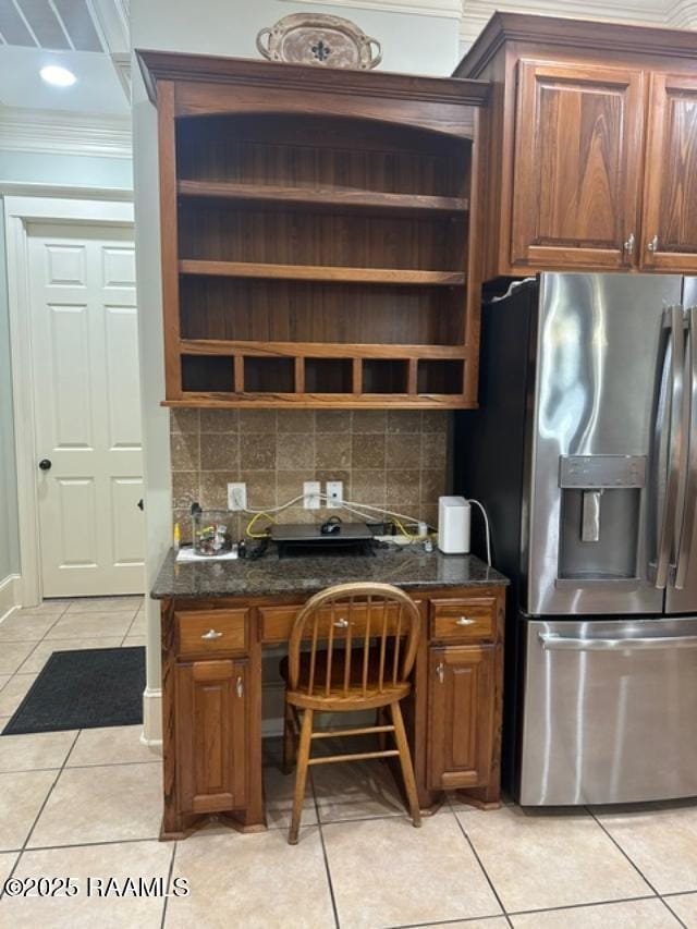 100 Serenity Sound Dr, Lafayette, LA 70506 - kitchen featuring stainless steel fridge, crown molding, open shelves, light tile patterned floors, and backsplash