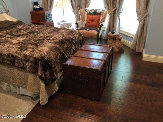106 Princeton Woods Loop, Lafayette, LA 70508 - bedroom featuring dark wood-style flooring and baseboards