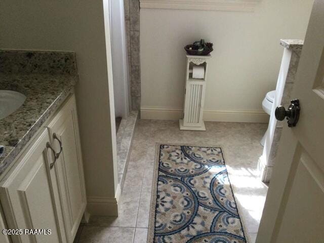 106 Princeton Woods Loop, Lafayette, LA 70508 - bathroom with vanity, tile patterned floors, and ornamental molding