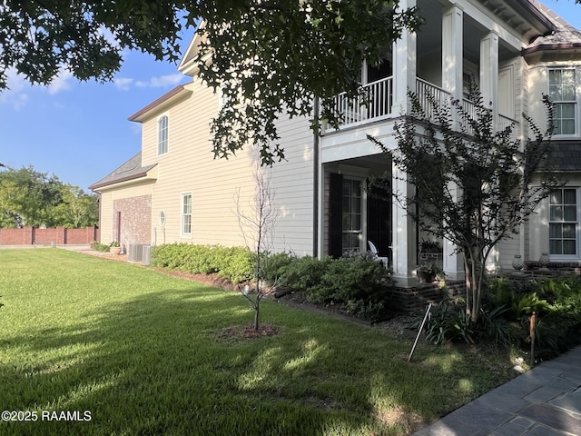 106 Princeton Woods Loop, Lafayette, LA 70508 - view of home's exterior with a balcony and a cooling unit