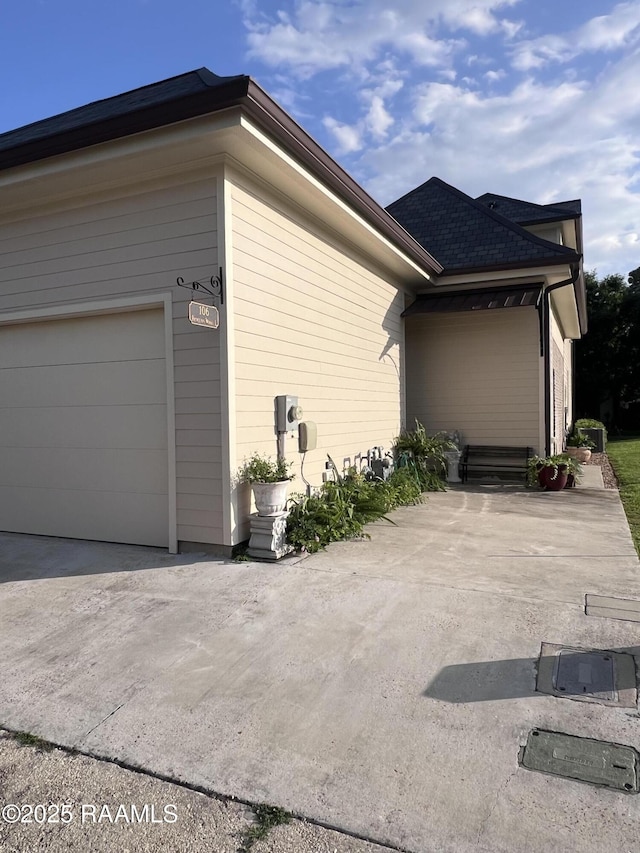 106 Princeton Woods Loop, Lafayette, LA 70508 - view of home's exterior featuring a garage
