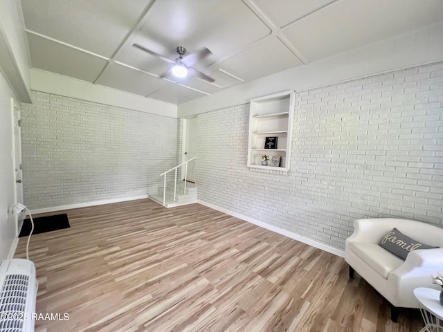 5501 Northside Rd, New Iberia, LA 70563 - unfurnished room featuring brick wall and wood finished floors