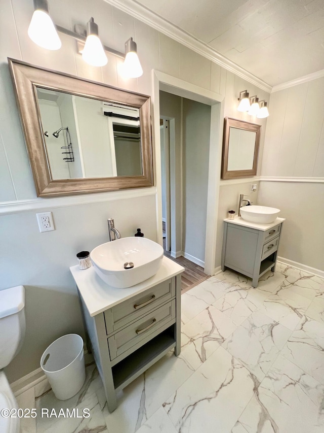 5501 Northside Rd, New Iberia, LA 70563 - full bathroom with ornamental molding, two vanities, and marble look tiles
