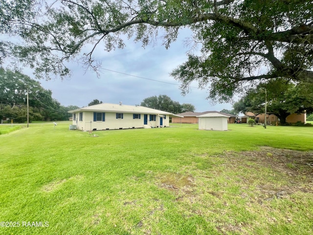 5501 Northside Rd, New Iberia, LA 70563 - back of property featuring a lawn