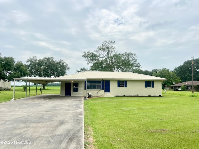 5501 Northside Rd, New Iberia, LA 70563 - ranch-style home with a front yard, a carport, and concrete driveway