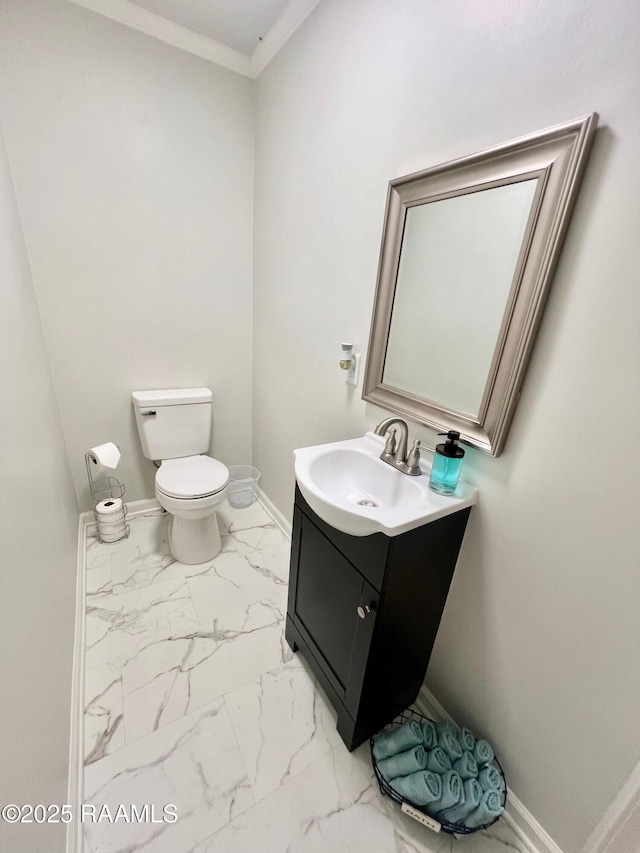 5501 Northside Rd, New Iberia, LA 70563 - bathroom with marble finish flooring, vanity, and crown molding