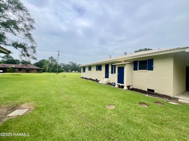 5501 Northside Rd, New Iberia, LA 70563 - view of grassy yard featuring entry steps