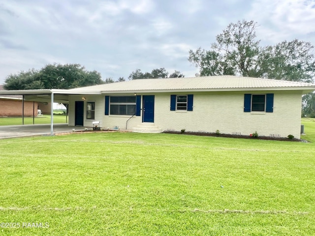 5501 Northside Rd, New Iberia, LA 70563 - ranch-style home with brick siding, a front lawn, and an attached carport