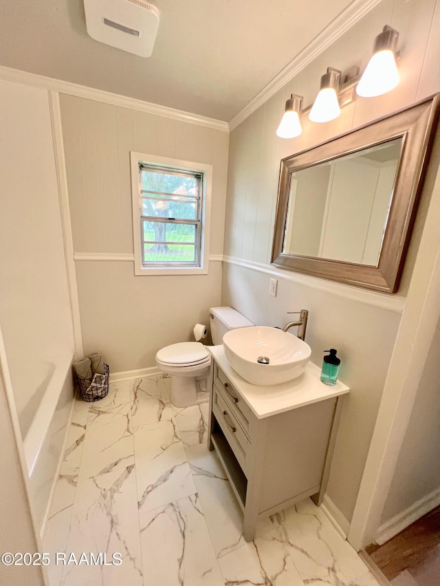 5501 Northside Rd, New Iberia, LA 70563 - full bathroom featuring ornamental molding, vanity, marble look tile flooring, and a tub to relax in