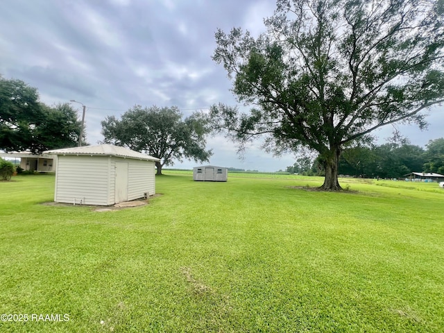 5501 Northside Rd, New Iberia, LA 70563 - view of green lawn with a shed