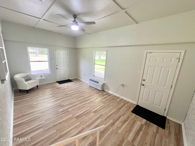 5501 Northside Rd, New Iberia, LA 70563 - entrance foyer featuring light wood-type flooring, ceiling fan, and a wall mounted air conditioner