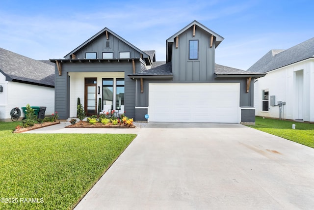 127 Lakes Edge Dr, Broussard, LA 70518 - modern farmhouse style home with board and batten siding, a front lawn, driveway, and roof with shingles