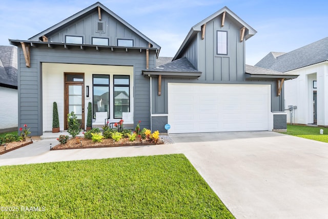 127 Lakes Edge Dr, Broussard, LA 70518 - modern inspired farmhouse with board and batten siding, concrete driveway, a front lawn, and roof with shingles